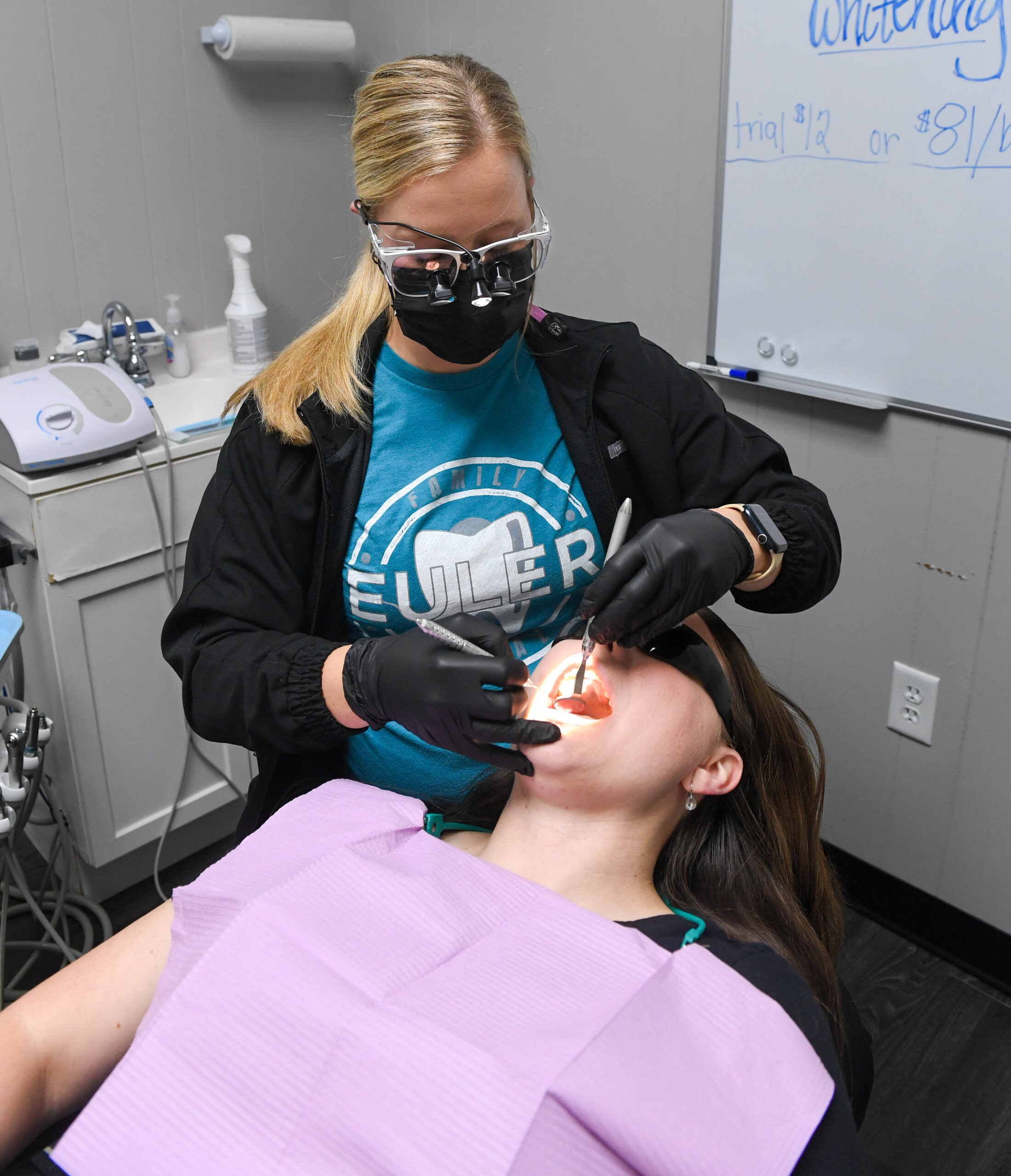 A dentist patient getting a teeth cleaning